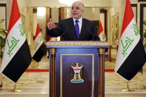 Iraqi premier-designate Haider al-Abadi speaks at his first press conference since accepting the nomination to be Iraq’s next prime minister, in Baghdad, Iraq, Monday, Aug. 25, 2014. Al-Abadi called on the country's numerous Shiite militias and tribes to come under government control and stop acting independently on Monday, as violence across the country killed over 40 people in areas where the Muslim sect dominates. Since early this year, Iraq has been facing a growing Sunni insurgency with the Islamic State group and allied Sunni militants who have taken over areas in the country's west and north. (AP Photo/Office of the Iraqi Prime Minister)